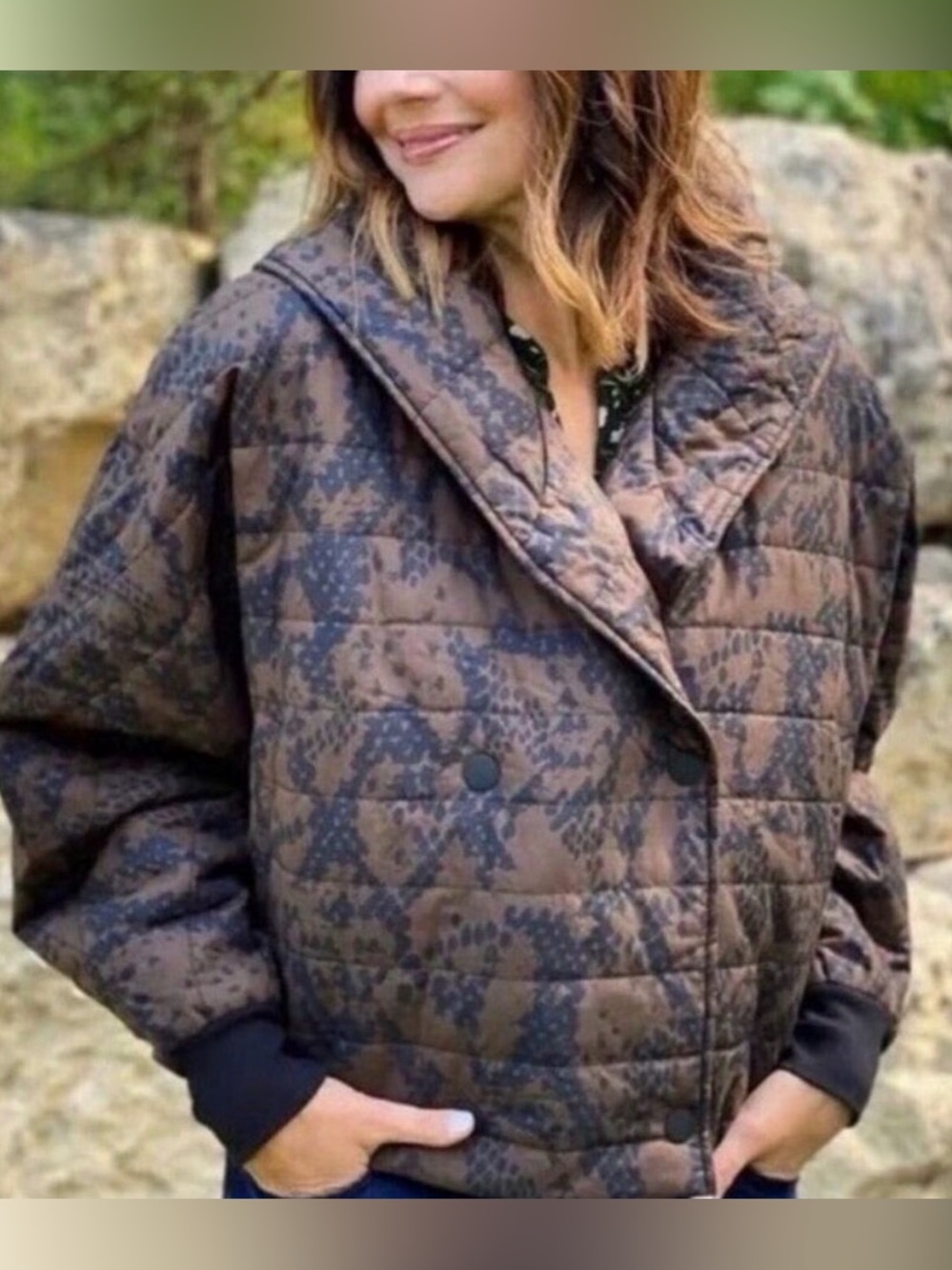CAbi Wrap Up Puffer Jacket in a brown python snake print